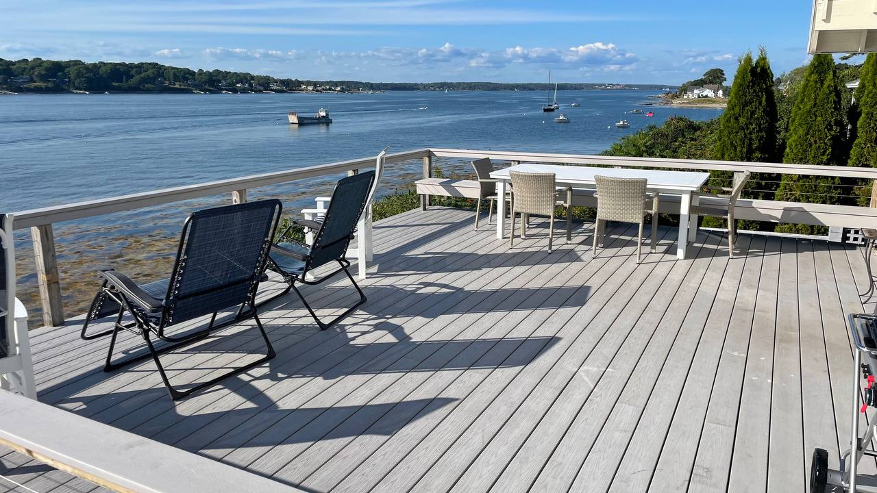 Deck seating area with water views