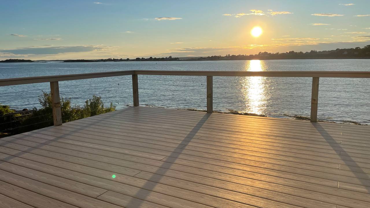 Deck at golden hour with sunset reflection