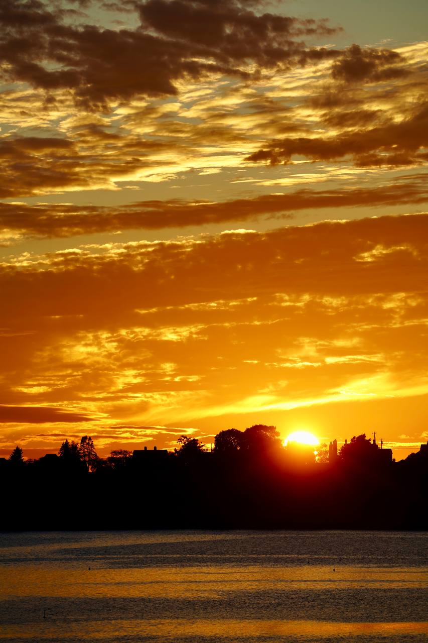 Dramatic sunset over the water